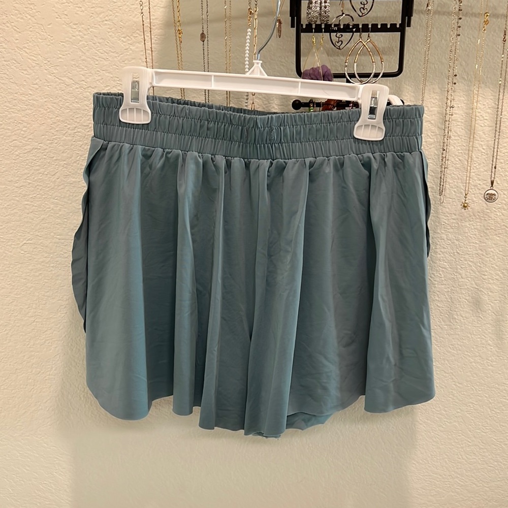 Light blue workout shorts with spandex underneath